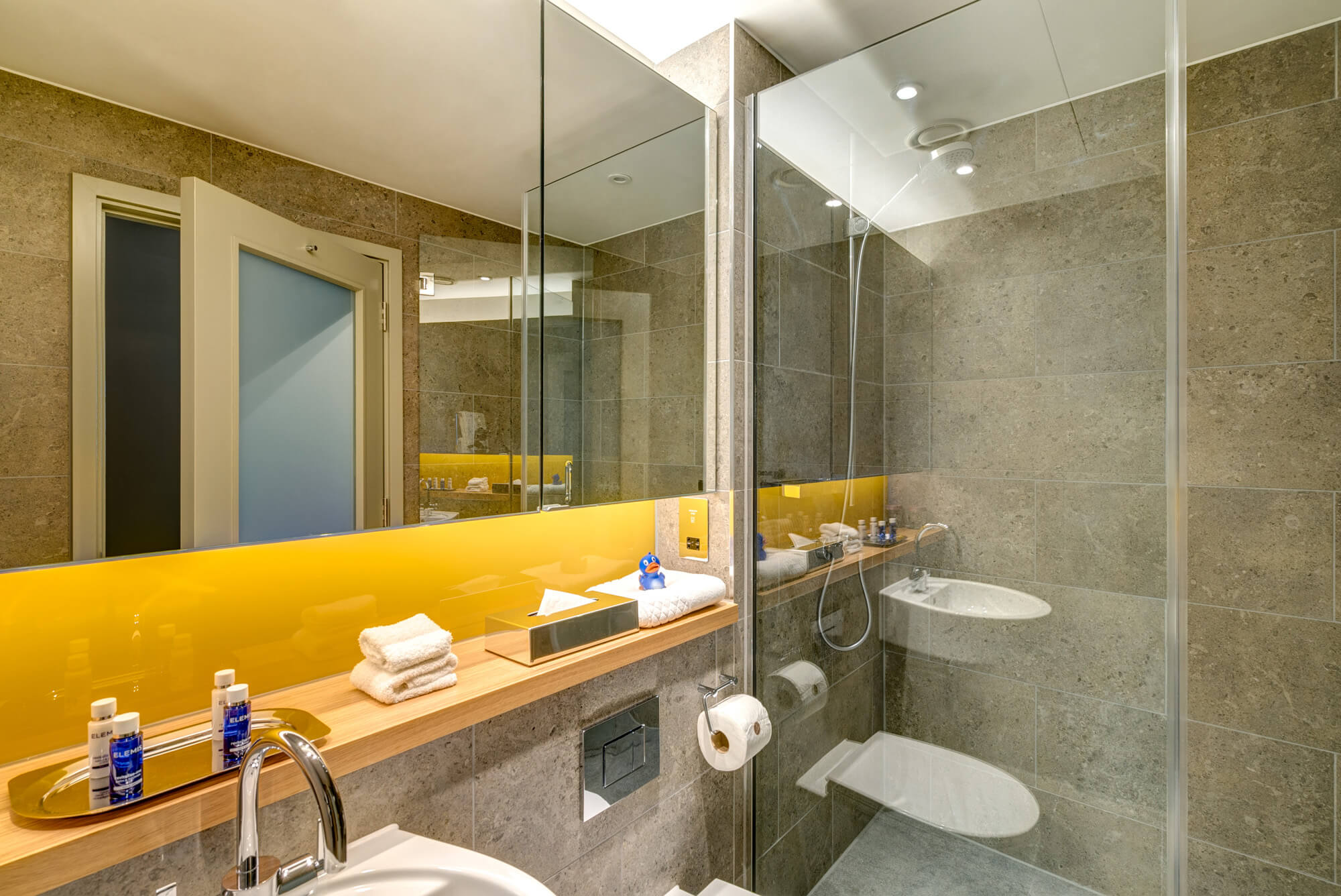 Deluxe Room bathroom with walk-in shower